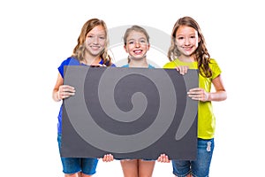 Happy kid girls holding black board copyspace