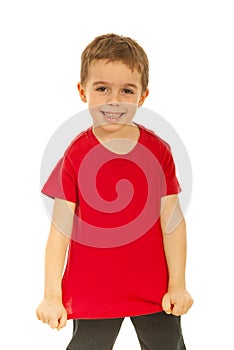 Happy kid showing his blank red t-shirt