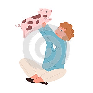 Happy kid sitting with spotty piglet. Child holding little pig in hands. Portrait of glad boy with minipig. Colored flat