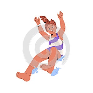 Happy kid slides on waterslide with hands up and splashing with water. Excited child playing in swimming pool. Little