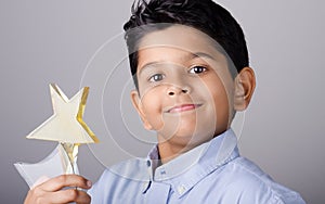 Happy kid or student with award.