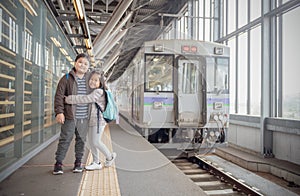 Happy kid traveler with old japan train
