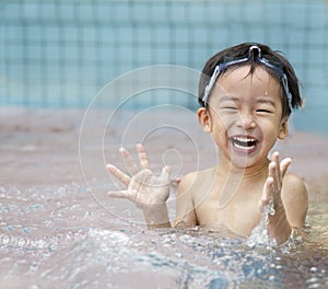 Happy kid in the water