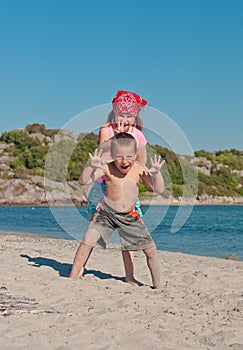 Happy kids on the beach