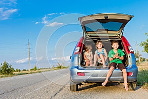 happy kids in car, family trip, summer vacation travel