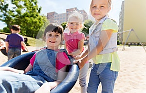 Happy kids on children playground