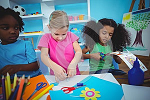 Happy kids doing arts and crafts together