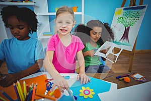 Happy kids doing arts and crafts together