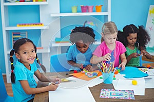 Happy kids doing arts and crafts together