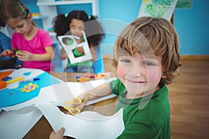 Happy kids doing arts and crafts together