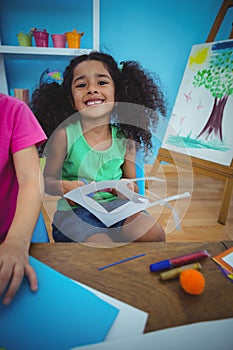 Happy kids doing arts and crafts together