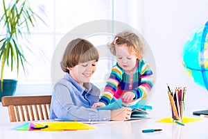 Happy kids doing homework