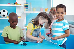 Happy kids enjoying arts and crafts together