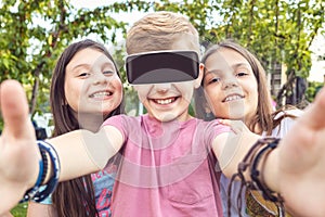 Happy kids enjoying metaverse experience with vr games