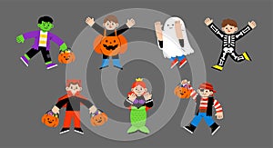 Happy kids in Halloween costume for Trick or Treat on white background.