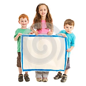 Happy kids holding blank sign