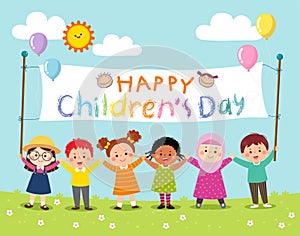 Happy kids holding Children`s Day banner