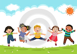 Happy kids jumping together during a sunny day