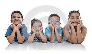 Happy Kids Laying on the Floor Posing for Photo