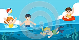 Happy kids play and swim in the sea. A Little boy diving with fish under the ocean. Kids having fun outdoors.