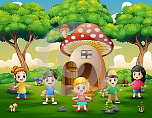 Happy kids playing on the fantasy house of mushroom