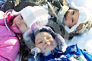 Happy Kids Playing in Fresh Snow