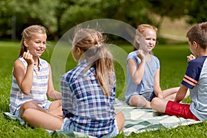 Happy kids playing rock-paper-scissors game