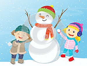 Happy kids playing with snowman.