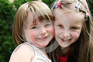 Happy kids playing together outdoor.