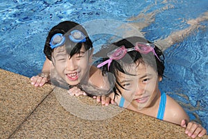 Happy kids in the pool