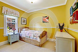 Happy kids room in bright yellow