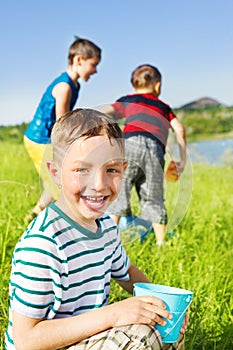 Happy kids in wet clothing