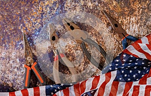 Happy Labor day American flag and construction tools. Copy space background