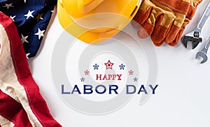 Happy Labor day concept. American flag with different construction tools on white background, with copy space for text