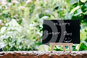 Happy labor day greeting card concept, Chalk board with text HAP