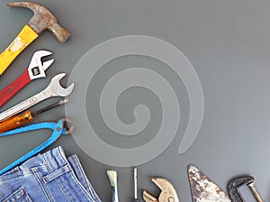 Happy Labor day , International father`s day - Many worker handy tools on gray background. Top view with copy space