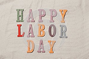 Happy Labor Day on the sandy beach background. Happy Labor Day w