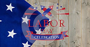 Happy labor day text and fireworks icons against american flag on wooden background