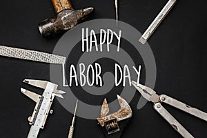 Happy labor day text sign. Tools for repairing and renovation co