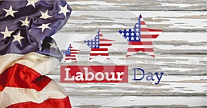 Happy labor day text and stars against american flag on wooden background