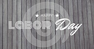 Happy labor day text and stars against wooden background