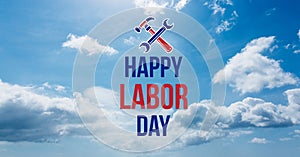 Happy labor day text and tools against clouds in blue sky