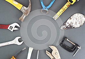Happy Labour day , USA Labor day, International father`s day - Many handy construction and manufacturing tools on gray background