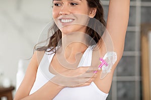 Happy Lady Shaving Underarms Removing Armpits Hair In Modern Bathroom