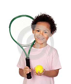 Happy latin child with a tennis racket