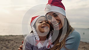 Happy Latin family enjoying Christmas holidays