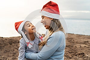 Happy Latin family enjoying Christmas holidays