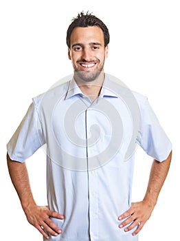 Happy latin man in a blue shirt