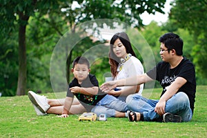 Happy latino family reading book