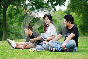 Happy latino family reading book